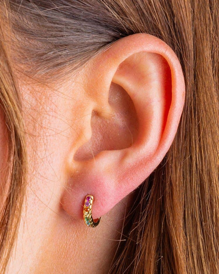 Close-up of an ear with a colorful earring