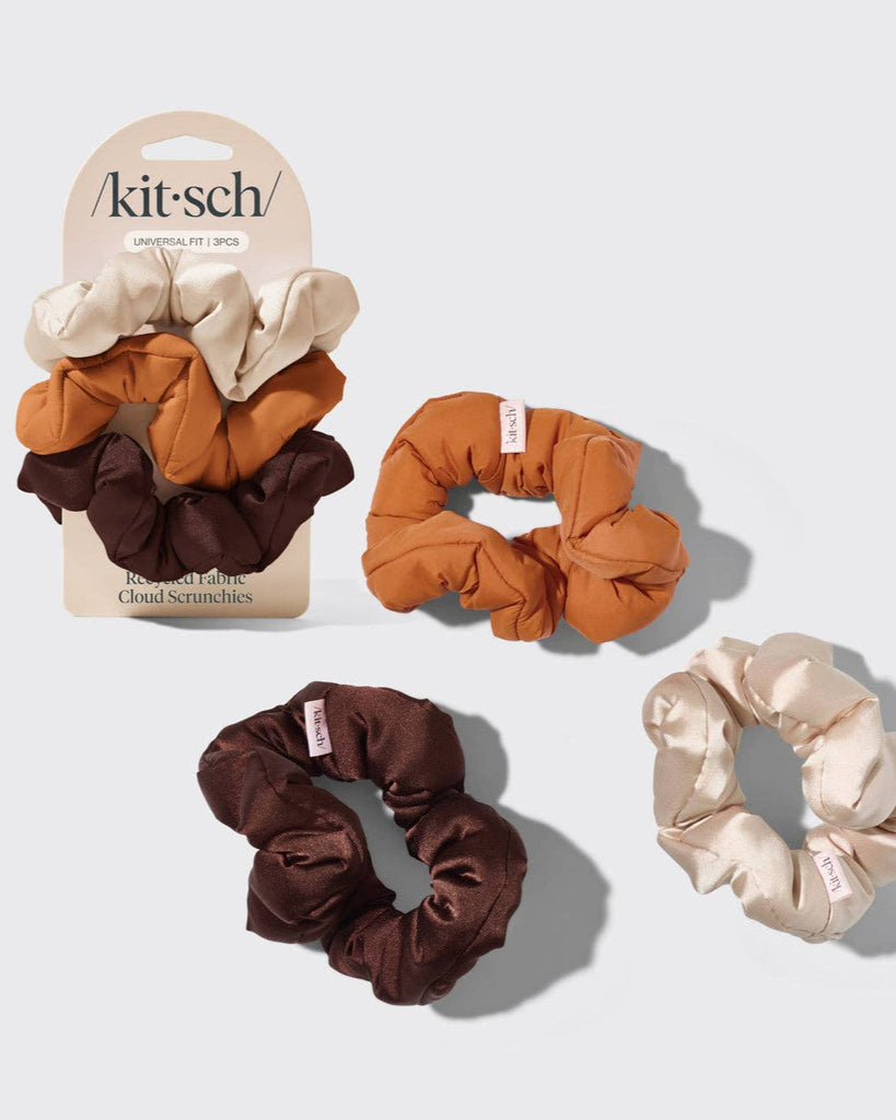 Set of three scrunchies in brown, orange, and beige on a white background with 'kit-sch' packaging.