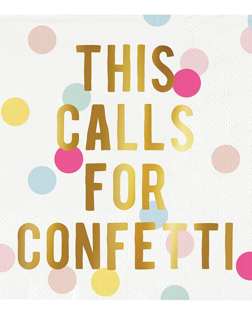 Napkin with gold text 'THIS CALLS FOR CONFETTI' on a white background with colorful polka dots.