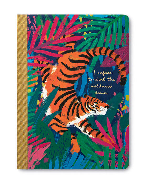 Notebook with a tiger design and colorful leaves on a white background