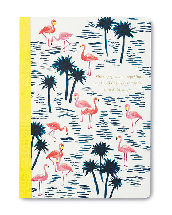 Notebook with flamingo and palm tree design on a white background